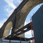 Stone arches of the High Bridge as seen from outside the office trailers on the Bronx side<br/>
